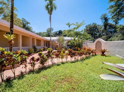 Beachside Hotel: Steps from Playa Chiquita's White Sands