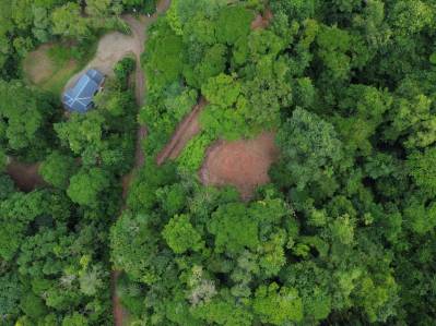 Lote de 1.8 acres con vista al mar en Portalon: privacidad, vistas y listo para construir