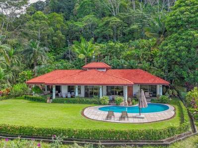 Ocean, jungle & mountain views on a meticulously landscaped 3-home family compound