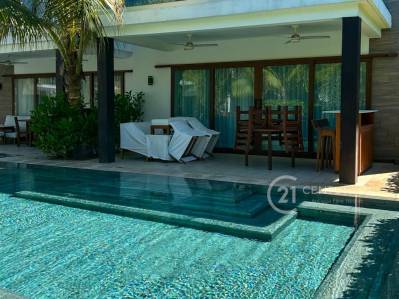 Stylish Coastal Villa with Shared Pool & Beach Access