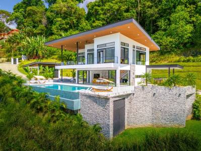 A BRAND NEW, Luxurious with Ocean Sunset Views, Jungle Immersion & Mountain Surrounds