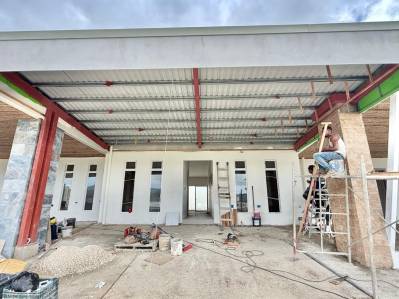 House under construction with luxury finishes and swimming pool
